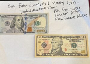 Fake US dollars display showing counterfeit $100 and $20 bills with realistic security features